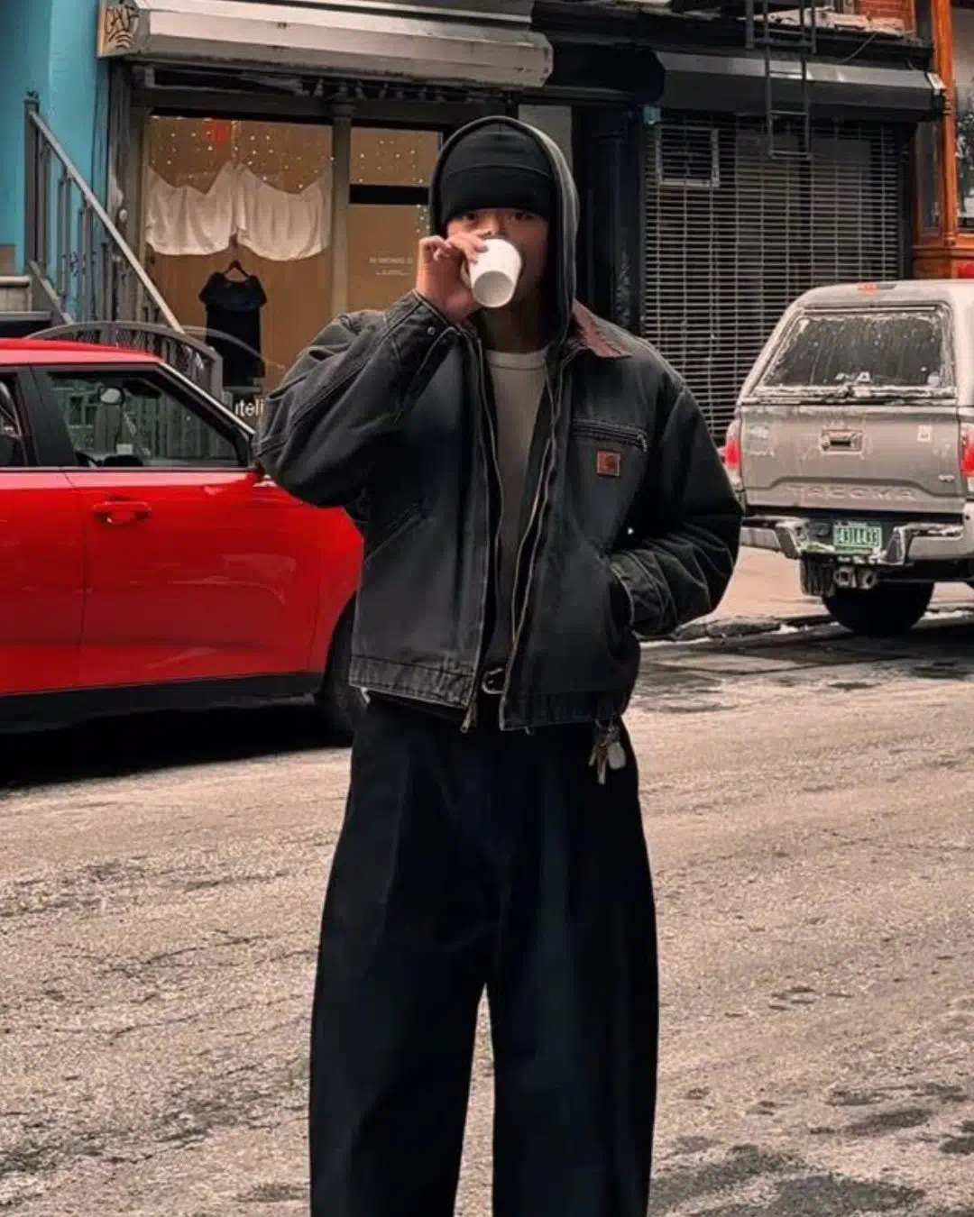 Classic workwear silhouettes softened through layering and everyday wear.