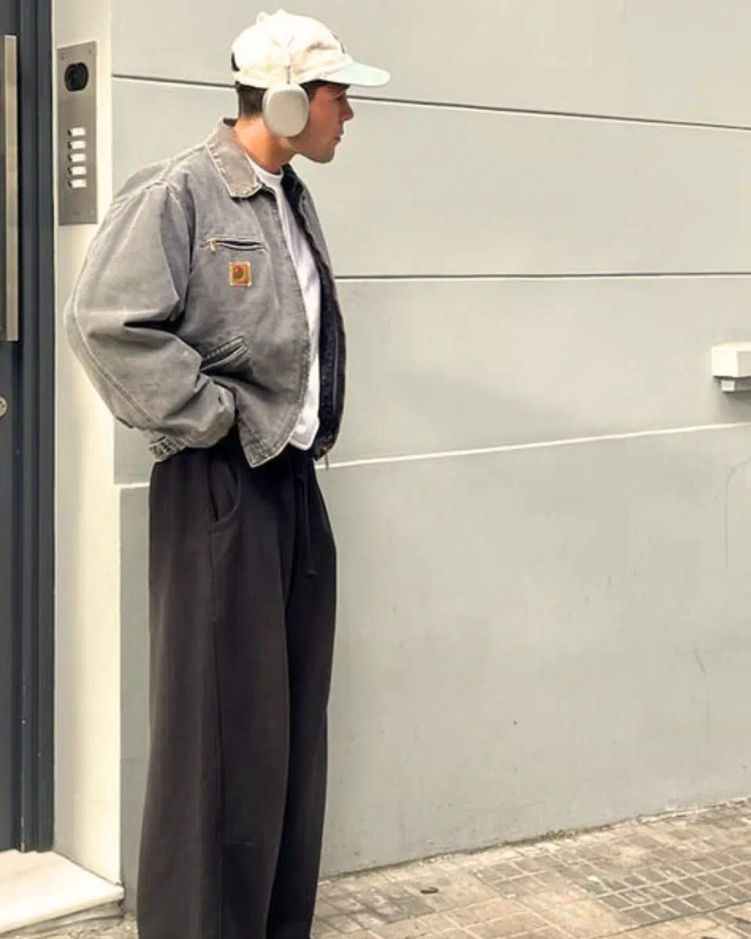 Archive Carhartt workwear, styled with relaxed tailoring.